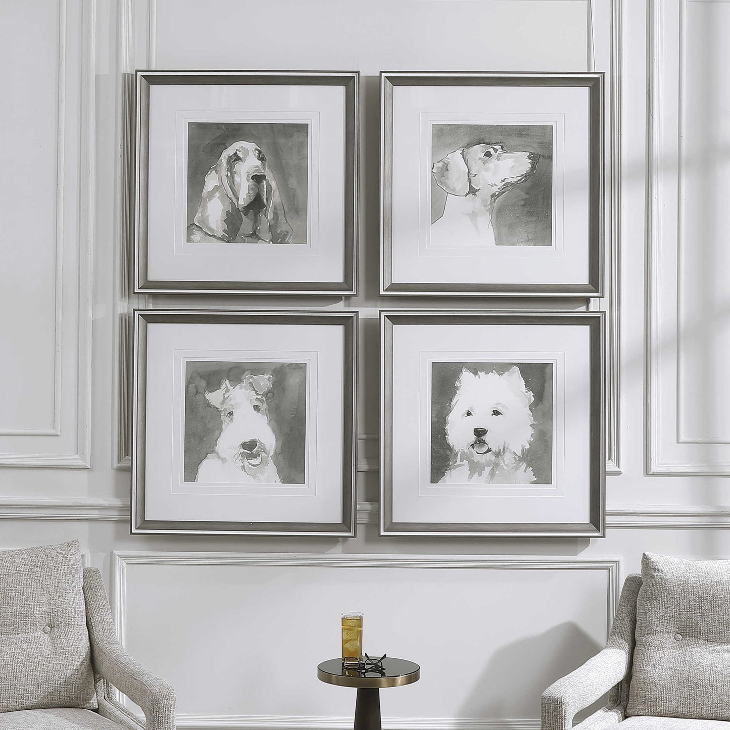 Straight on view of set of 4 dogs on a white wall with an accent table and drink in front. 