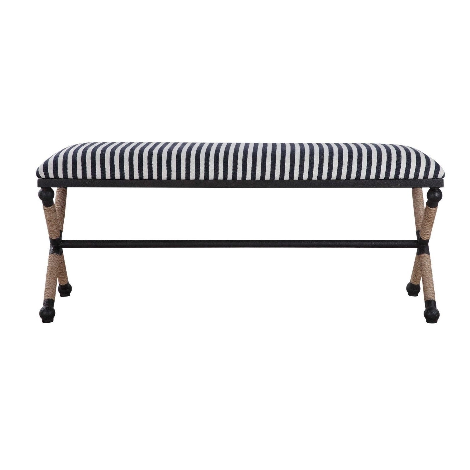 A bench with rustic iron is accented by a cushioned top, a sturdy sailor-striped cotton in crisp navy and cream.