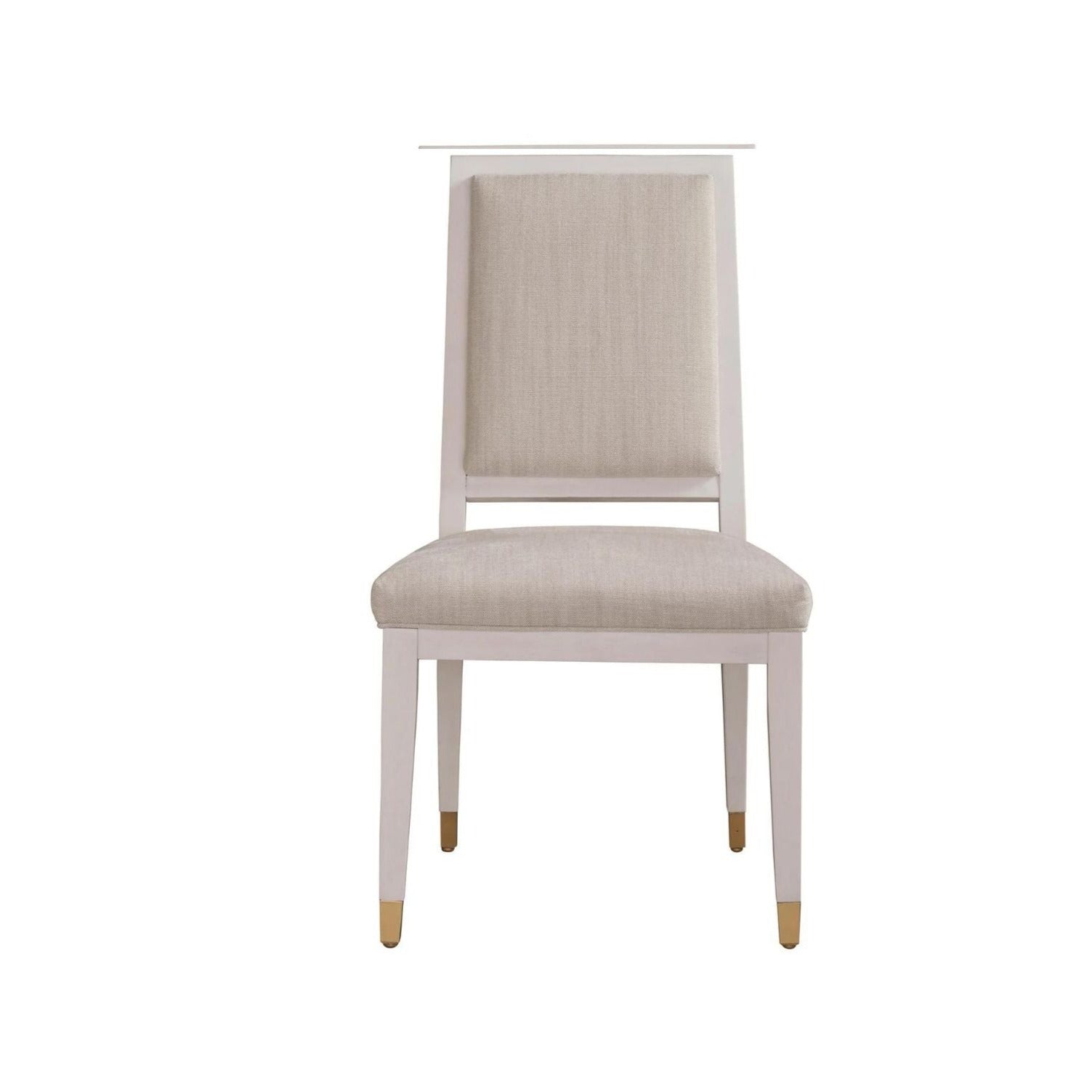 Dining chair with wood frame around seat and front top. Legs are capped at bottom with a decorative gold caps. Top of chair on back side is a solid wood pattern. Seat and back are covered with pewter colored fabric. 