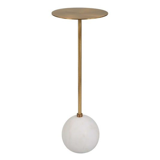 An elegant honed white marble foot supports the solid round brass top.