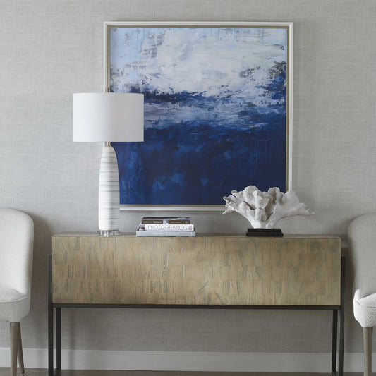 Abstract Ocean Sea Art with Coral Sculpture and Decorative Books on Gold Console Table.