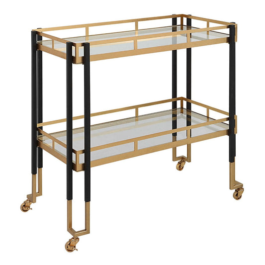 Black and gold classic bar cart with glass shelves.