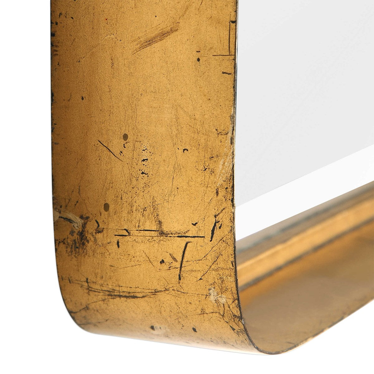 Corner of Antique Gold Leaf Mirror.