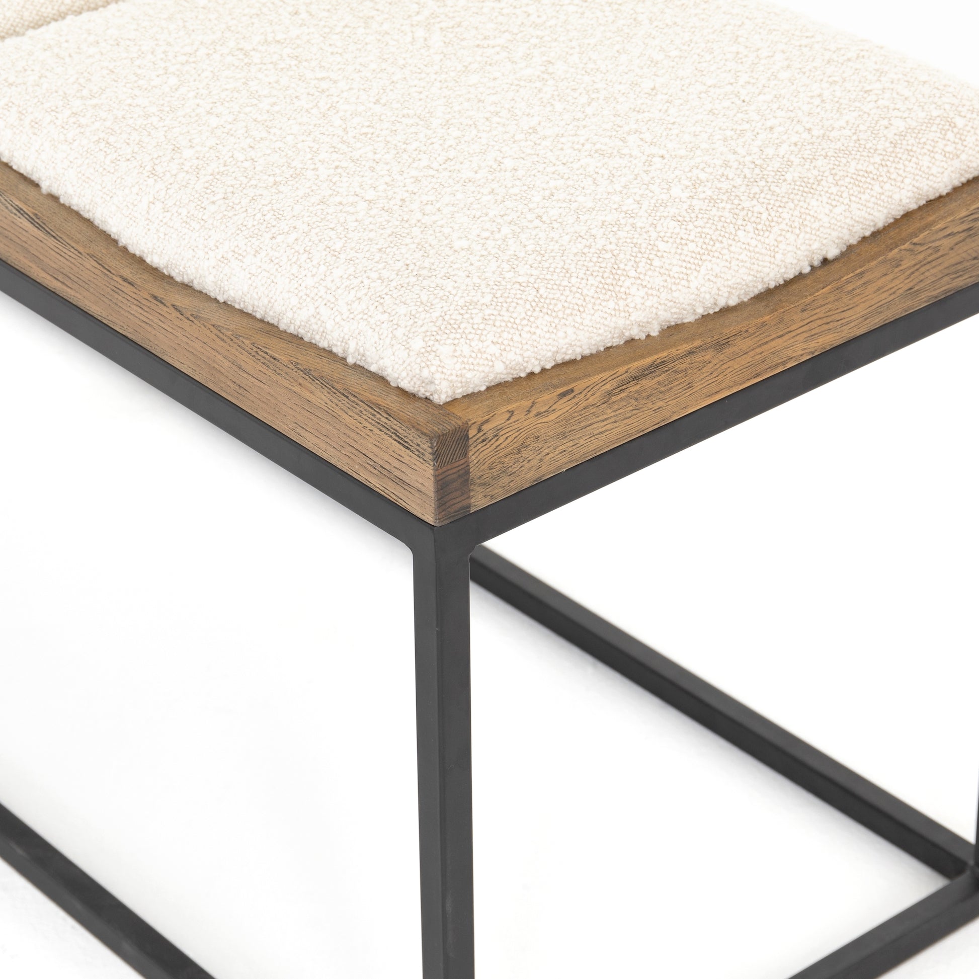 Boucle materials and wood and iron frame.