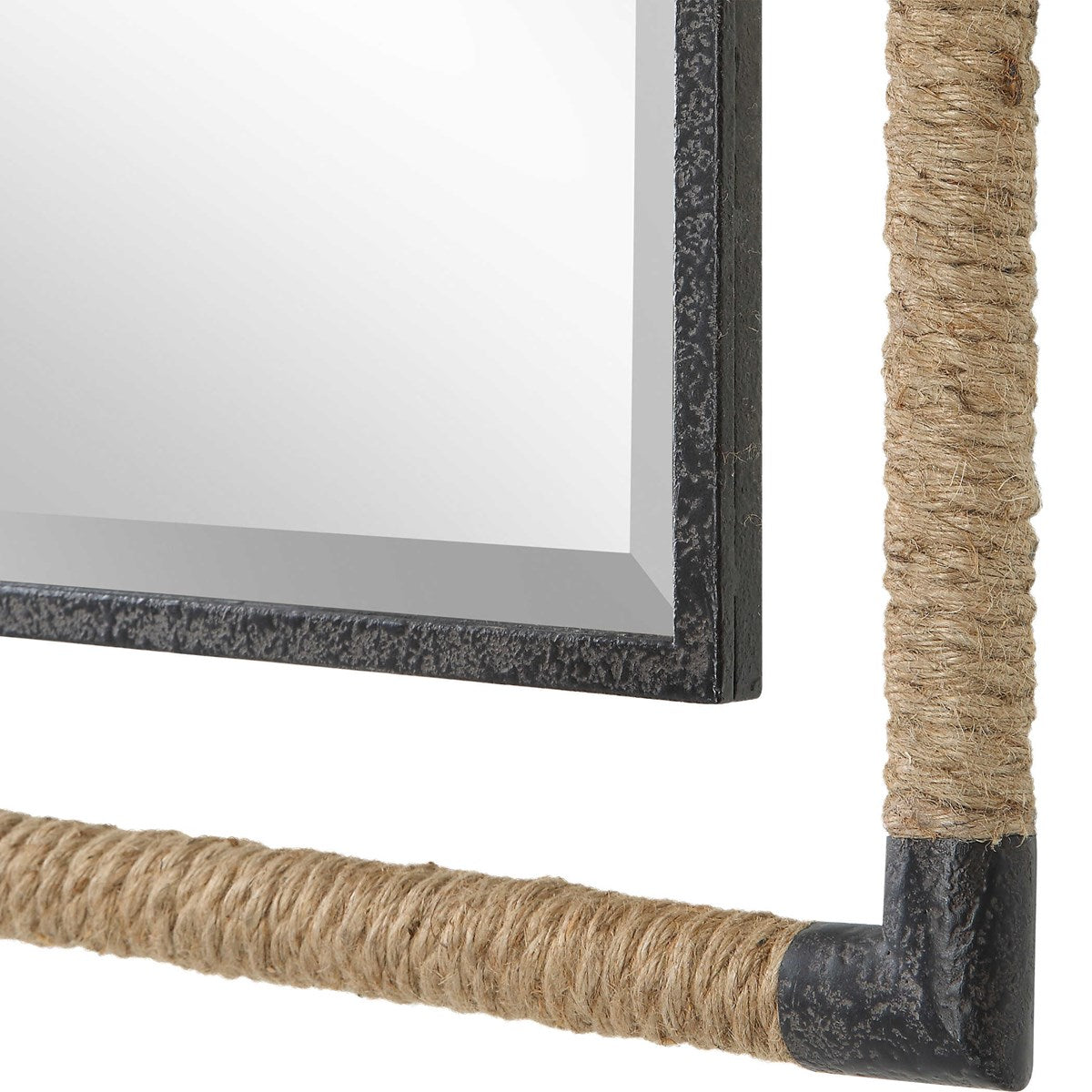 Corner of Mirror with Rope and Black Iron Frame.