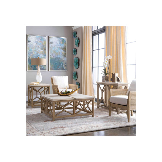 Square accent table with limestone top and reclaimed wood base. Shown in room setting with occasional chairs and lamp.